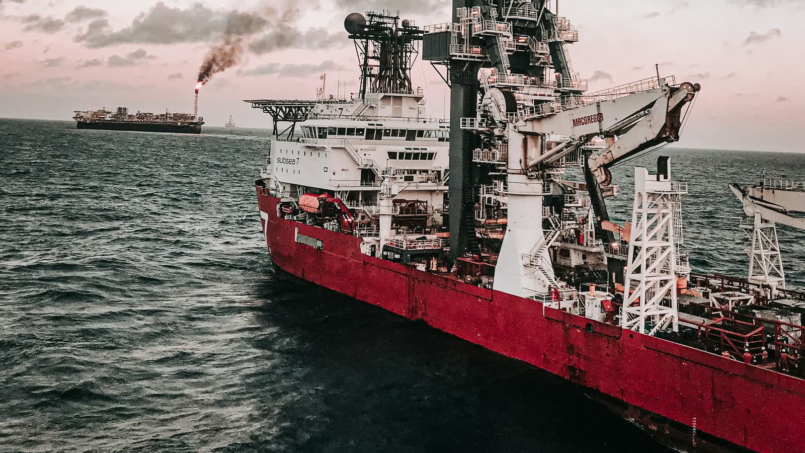 Offshore support vessel working at sea